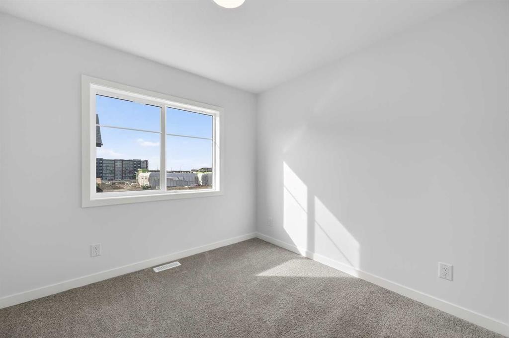 908-132 Red Embers Link Ne, Calgary, AB - Indoor Photo Showing Other Room