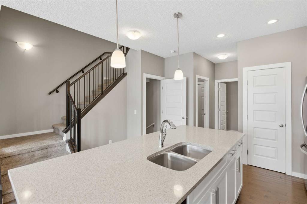 54 Legacy Close Se, Calgary, AB - Indoor Photo Showing Kitchen With Double Sink