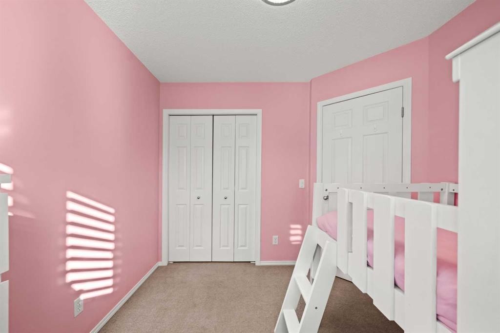 47 Eversyde Heath Sw, Calgary, AB - Indoor Photo Showing Bedroom