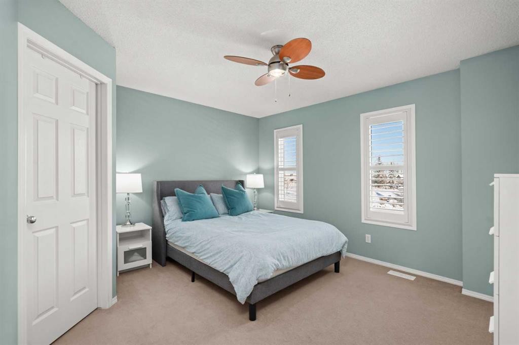 47 Eversyde Heath Sw, Calgary, AB - Indoor Photo Showing Bedroom