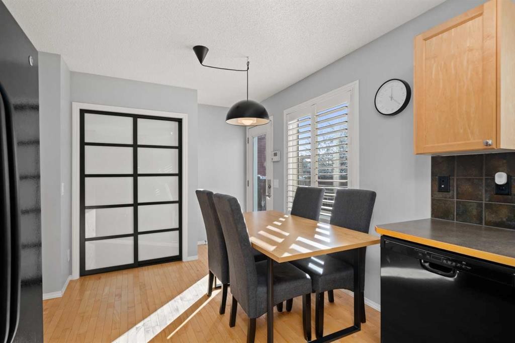 47 Eversyde Heath Sw, Calgary, AB - Indoor Photo Showing Dining Room