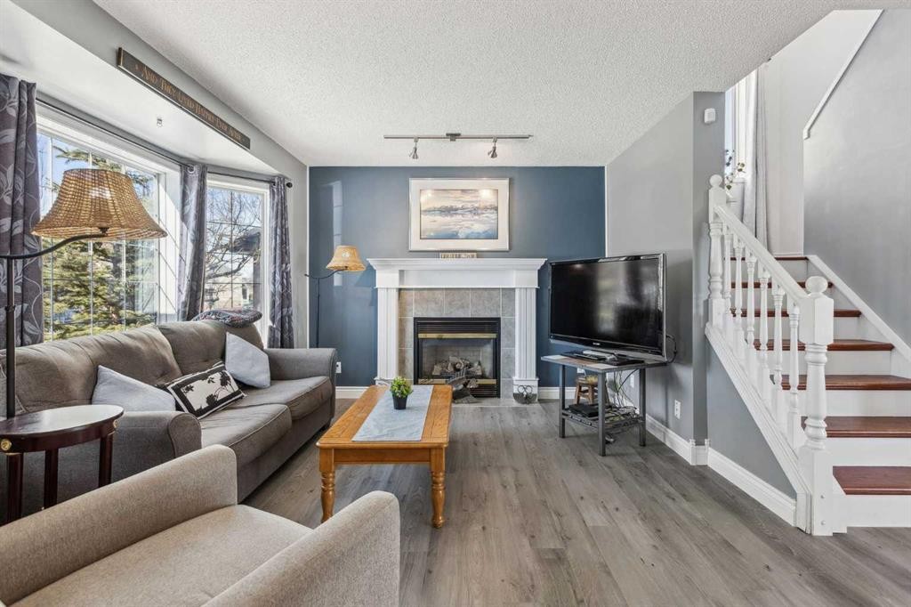 30 Martha'S Haven Manor Ne, Calgary, AB - Indoor Photo Showing Living Room With Fireplace
