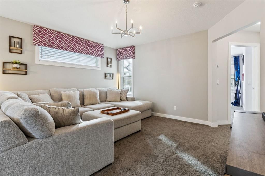 415 Rivercrest Boulevard, Cochrane, AB - Indoor Photo Showing Living Room