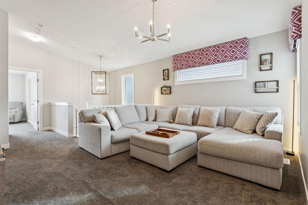 415 Rivercrest Boulevard, Cochrane, AB - Indoor Photo Showing Living Room