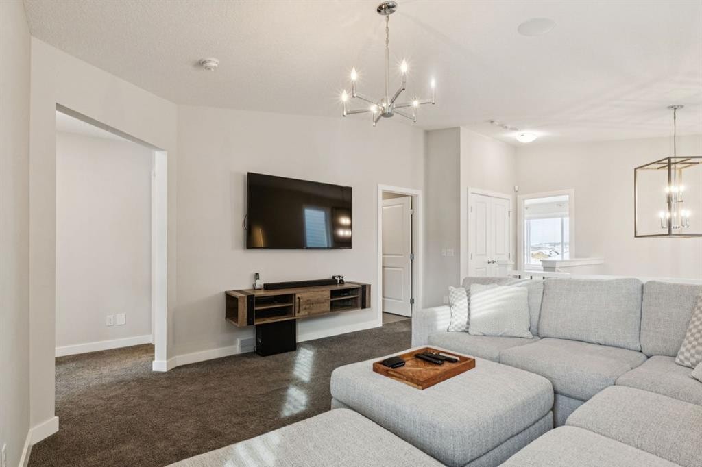 415 Rivercrest Boulevard, Cochrane, AB - Indoor Photo Showing Living Room