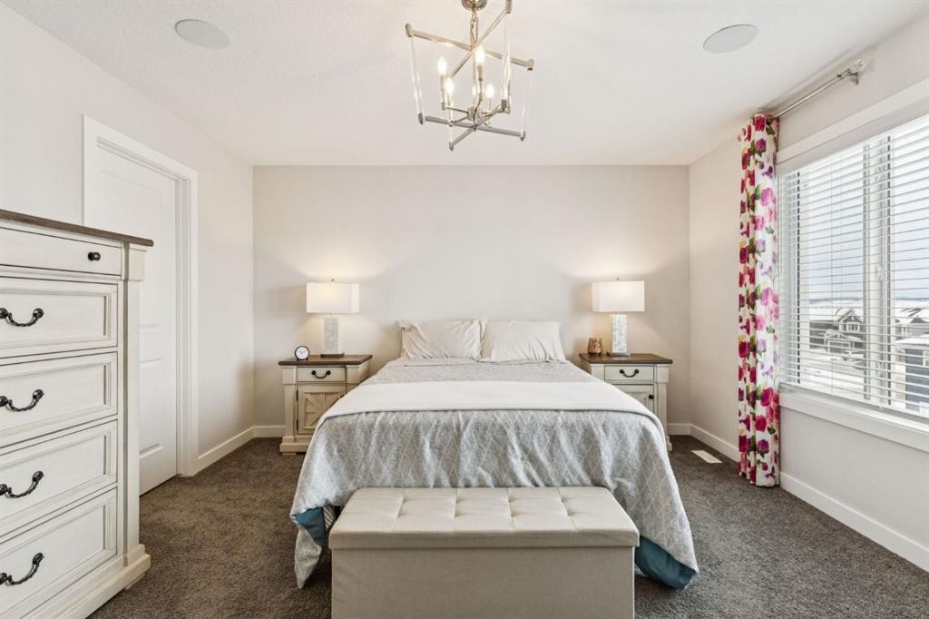 415 Rivercrest Boulevard, Cochrane, AB - Indoor Photo Showing Bedroom