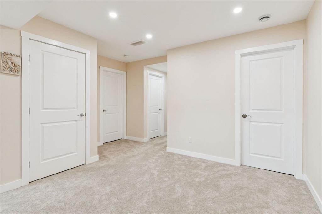 415 Rivercrest Boulevard, Cochrane, AB - Indoor Photo Showing Other Room