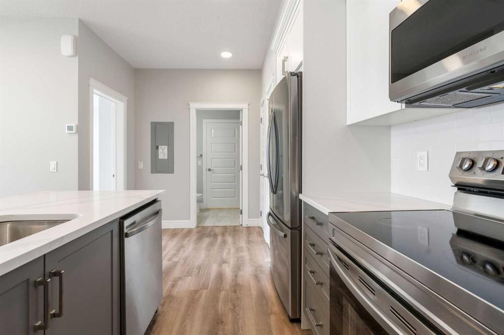 394 Seton Passage Se, Calgary, AB - Indoor Photo Showing Kitchen With Stainless Steel Kitchen