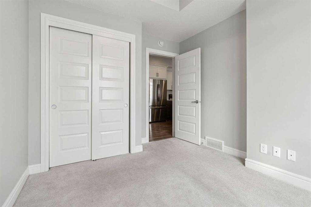 394 Seton Passage Se, Calgary, AB - Indoor Photo Showing Other Room