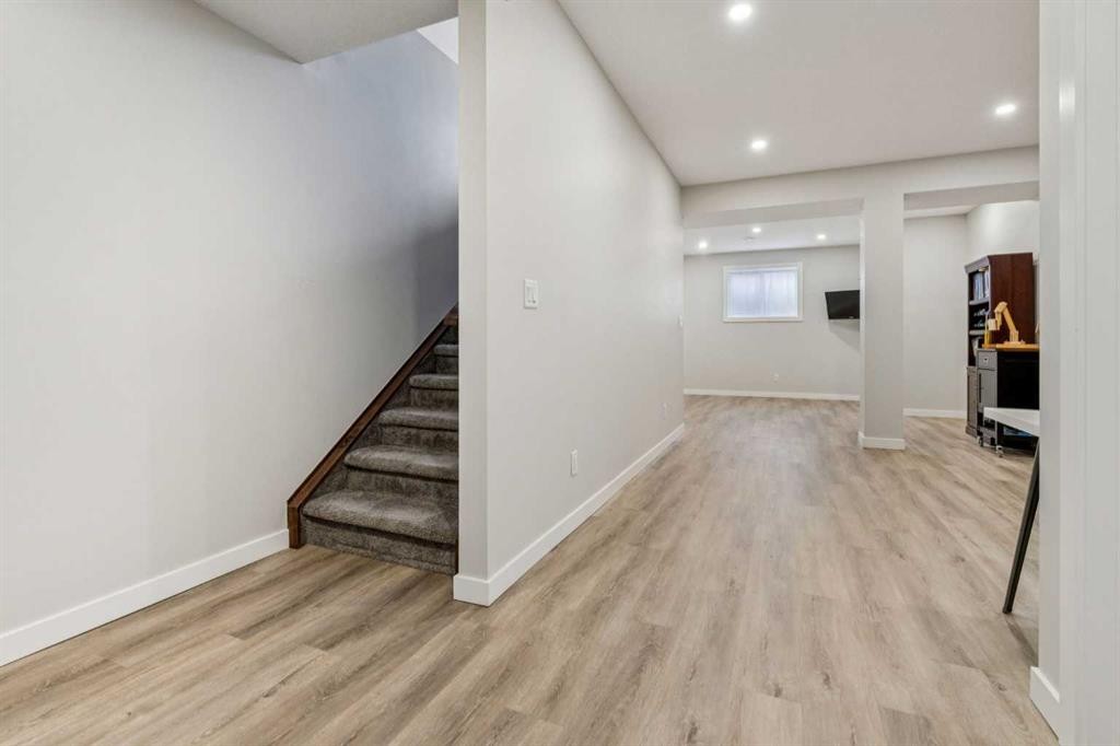 24 Willow Park Point, Cochrane, AB - Indoor Photo Showing Other Room