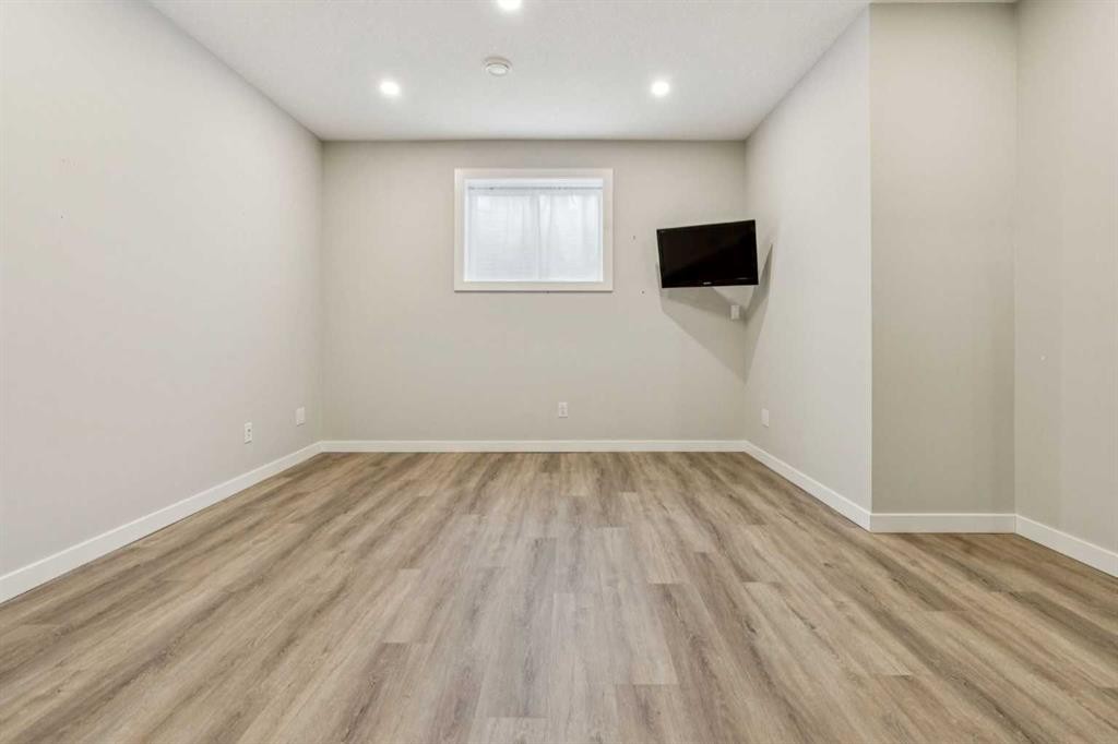 24 Willow Park Point, Cochrane, AB - Indoor Photo Showing Other Room