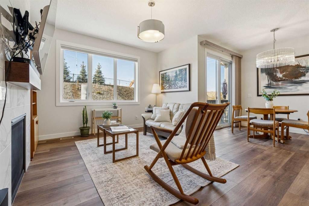 24 Willow Park Point, Cochrane, AB - Indoor With Fireplace