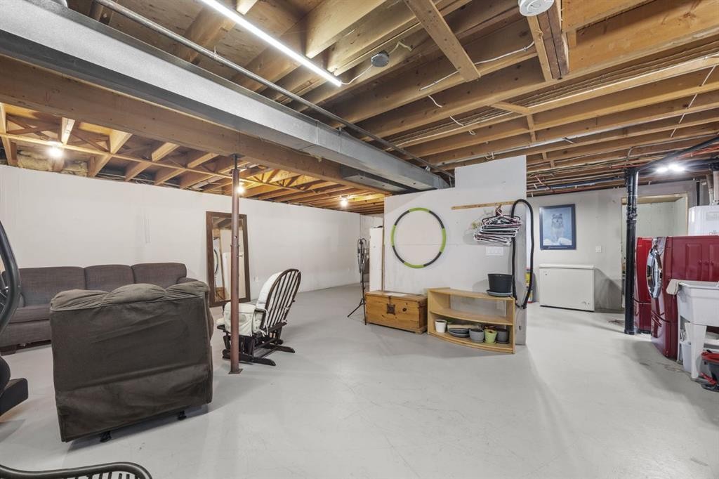 2302 Olympia Drive Se, Calgary, AB - Indoor Photo Showing Basement