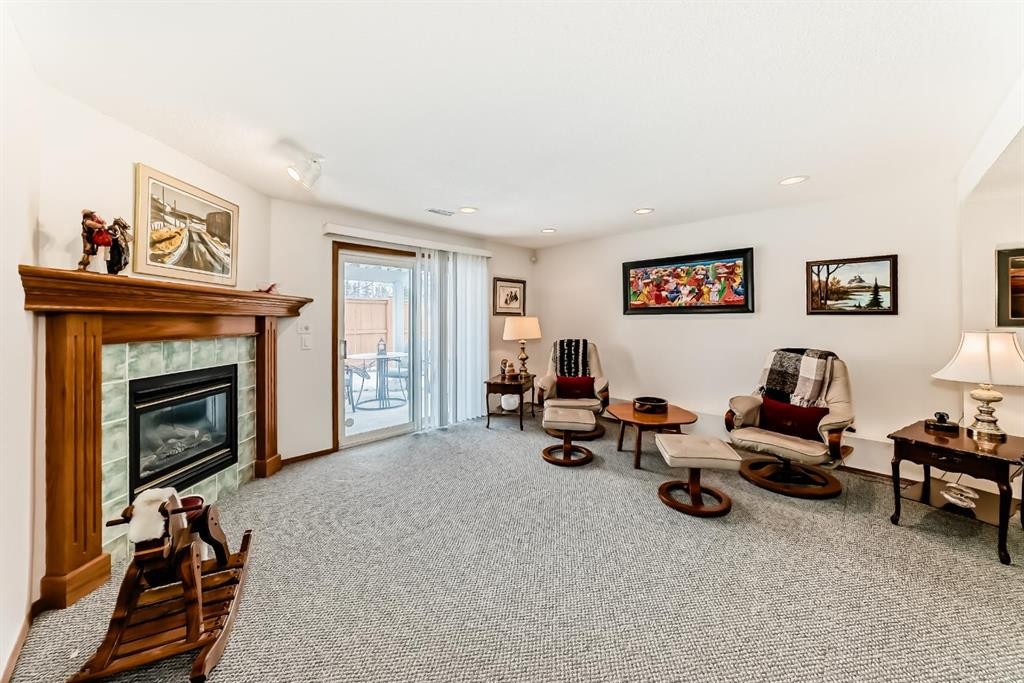 157 Hawkstone Manor Nw, Calgary, AB - Indoor With Fireplace
