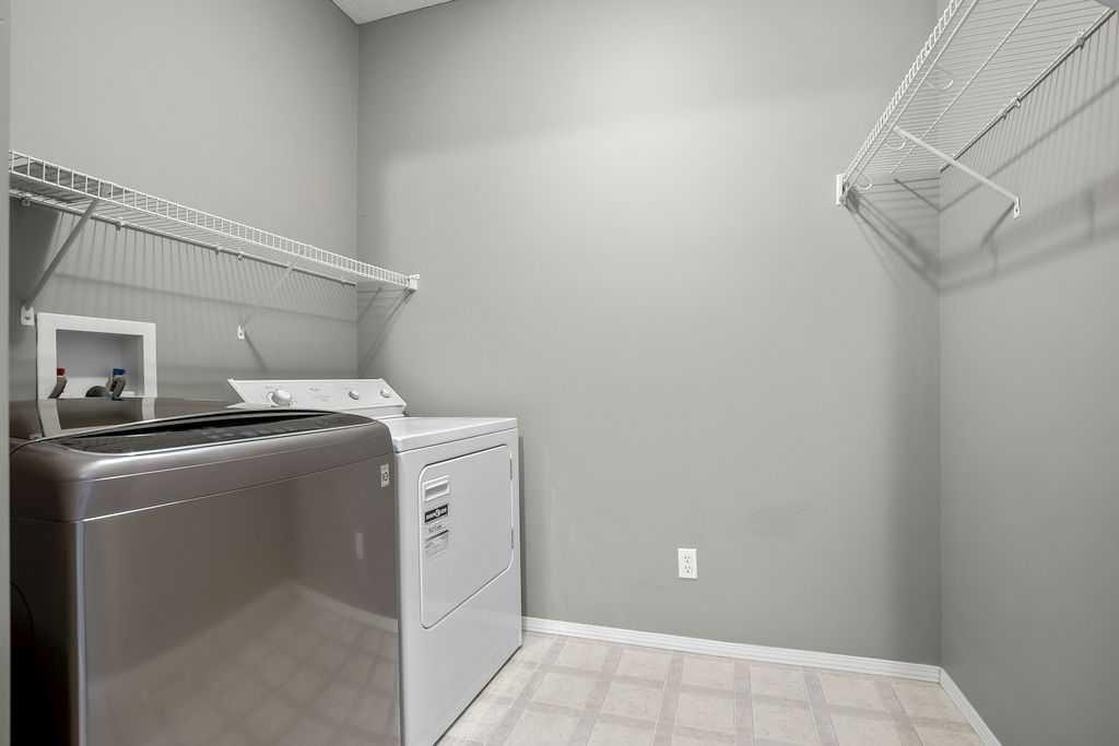 86 Evergreen Common Sw, Calgary, AB - Indoor Photo Showing Laundry Room