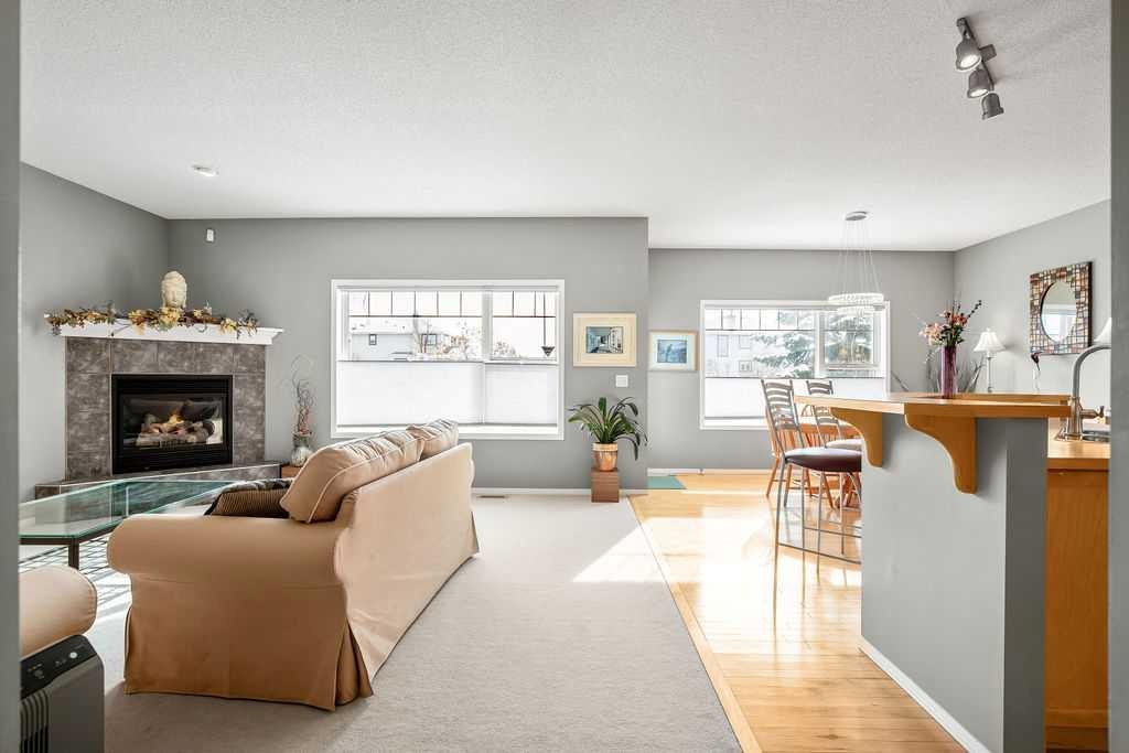 86 Evergreen Common Sw, Calgary, AB - Indoor Photo Showing Living Room With Fireplace