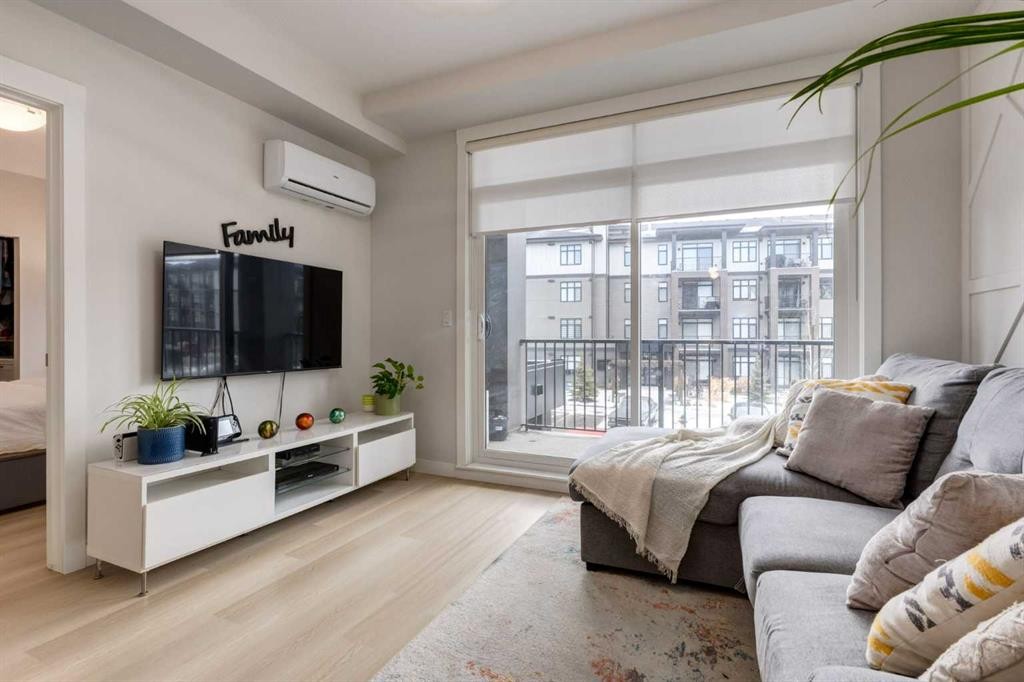 3205-200 Seton Circle Se, Calgary, AB - Indoor Photo Showing Living Room