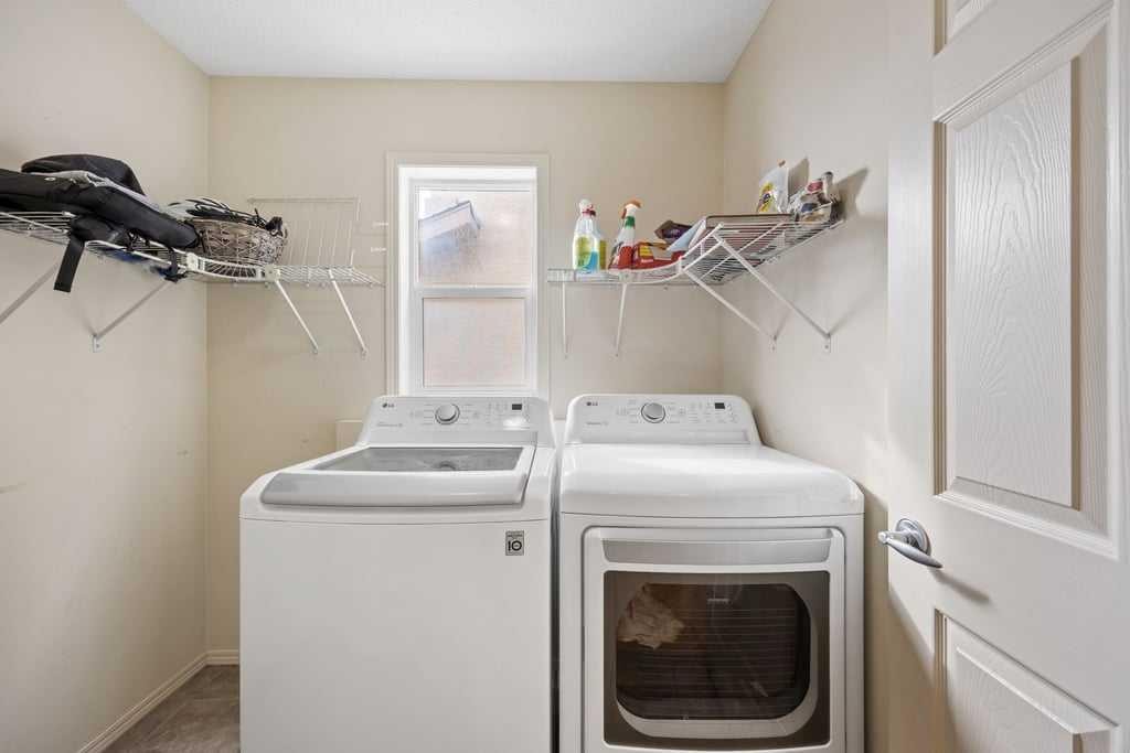19 Sienna Park Crescent Sw, Calgary, AB - Indoor Photo Showing Laundry Room