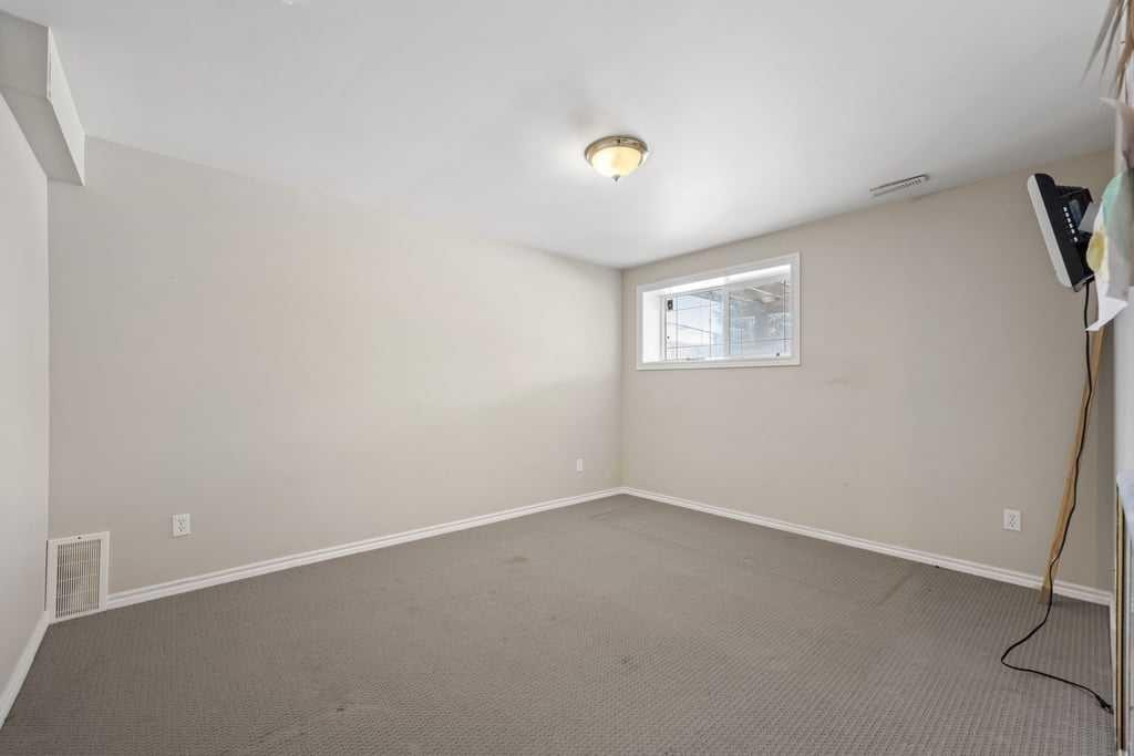 19 Sienna Park Crescent Sw, Calgary, AB - Indoor Photo Showing Other Room