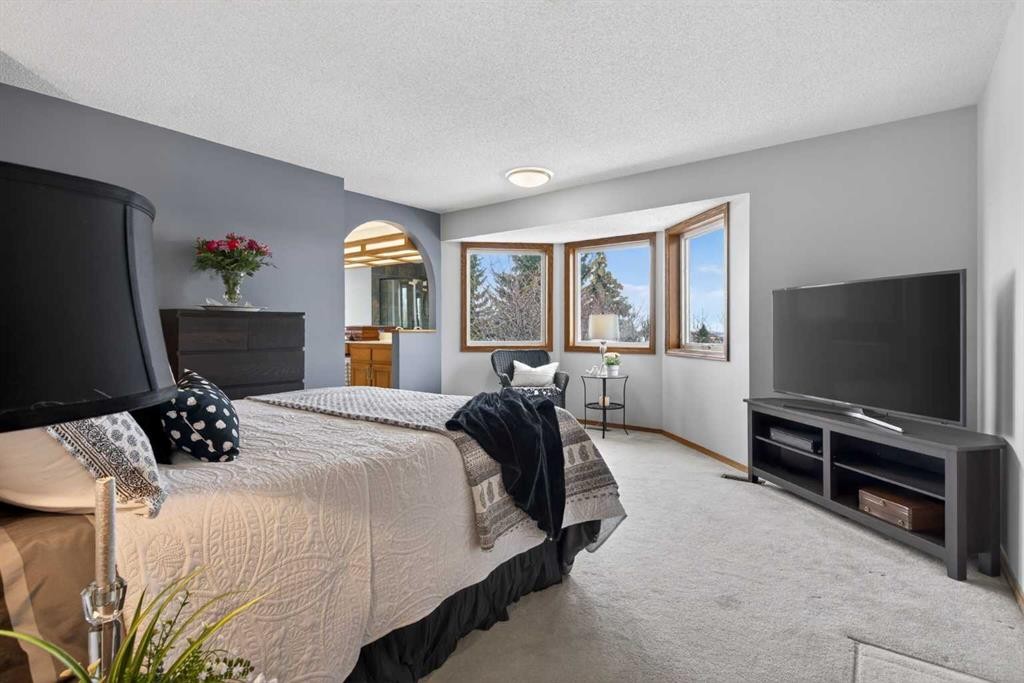 677 Hawkwood Boulevard Nw, Calgary, AB - Indoor Photo Showing Bedroom