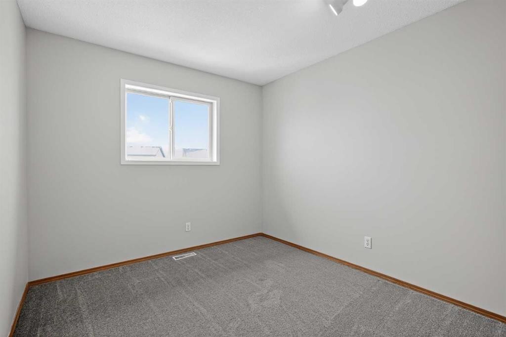 317 Martindale Drive Ne, Calgary, AB - Indoor Photo Showing Other Room