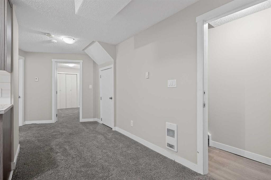 317 Martindale Drive Ne, Calgary, AB - Indoor Photo Showing Other Room