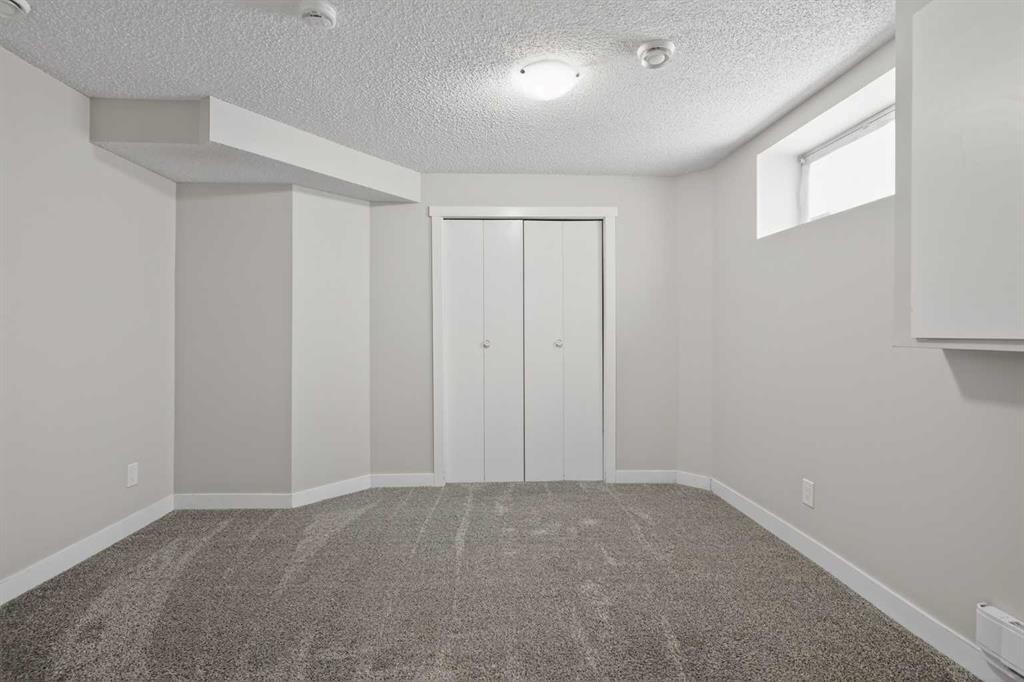 317 Martindale Drive Ne, Calgary, AB - Indoor Photo Showing Other Room