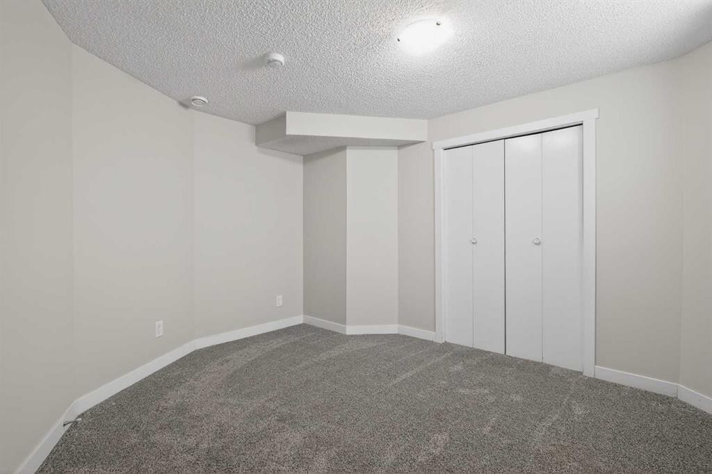 317 Martindale Drive Ne, Calgary, AB - Indoor Photo Showing Other Room