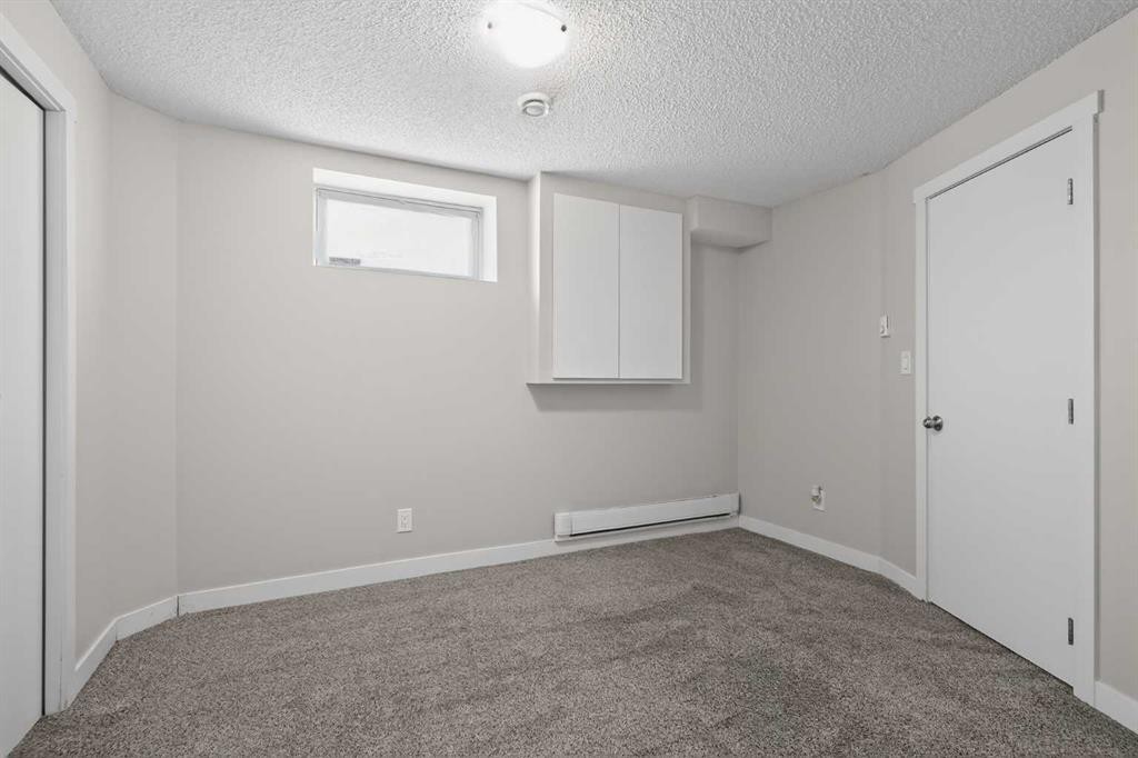 317 Martindale Drive Ne, Calgary, AB - Indoor Photo Showing Other Room