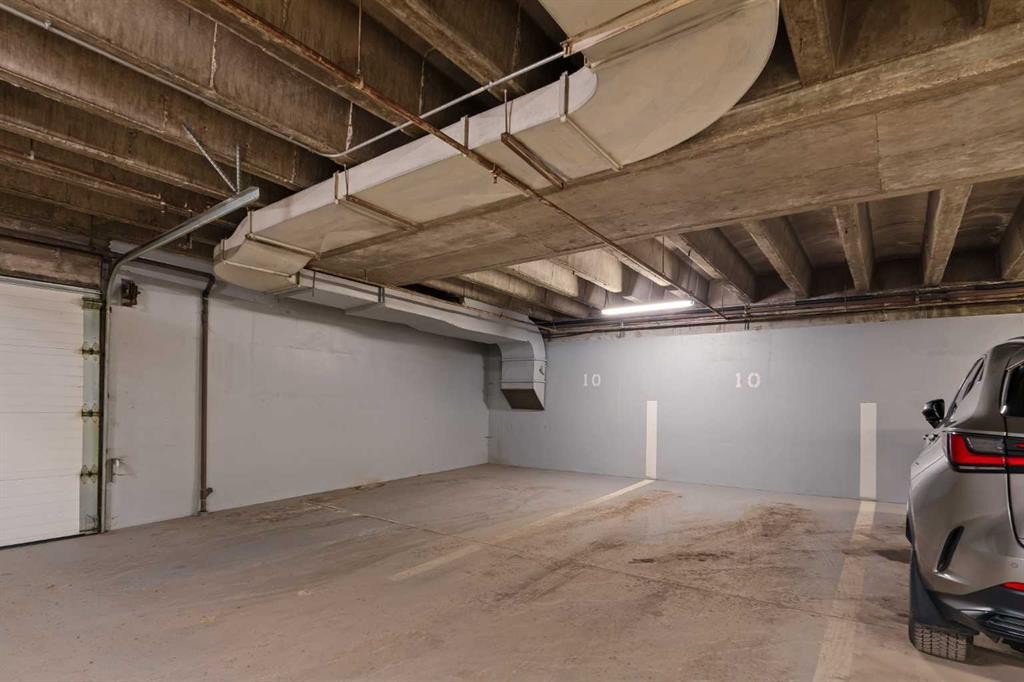 3S-222 Eagle Ridge Drive Sw, Calgary, AB - Indoor Photo Showing Garage