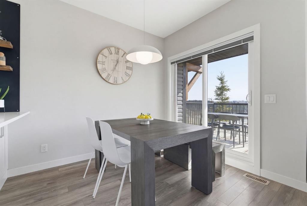 1208 Jumping Pound Common, Cochrane, AB - Indoor Photo Showing Dining Room