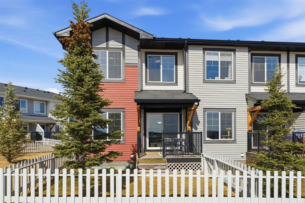 1208 Jumping Pound Common, Cochrane, AB - Outdoor With Facade