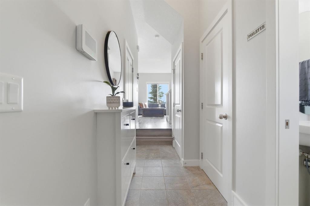 1208 Jumping Pound Common, Cochrane, AB - Indoor Photo Showing Other Room