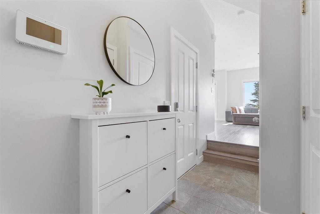 1208 Jumping Pound Common, Cochrane, AB - Indoor Photo Showing Other Room