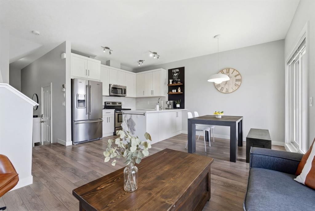 1208 Jumping Pound Common, Cochrane, AB - Indoor Photo Showing Kitchen