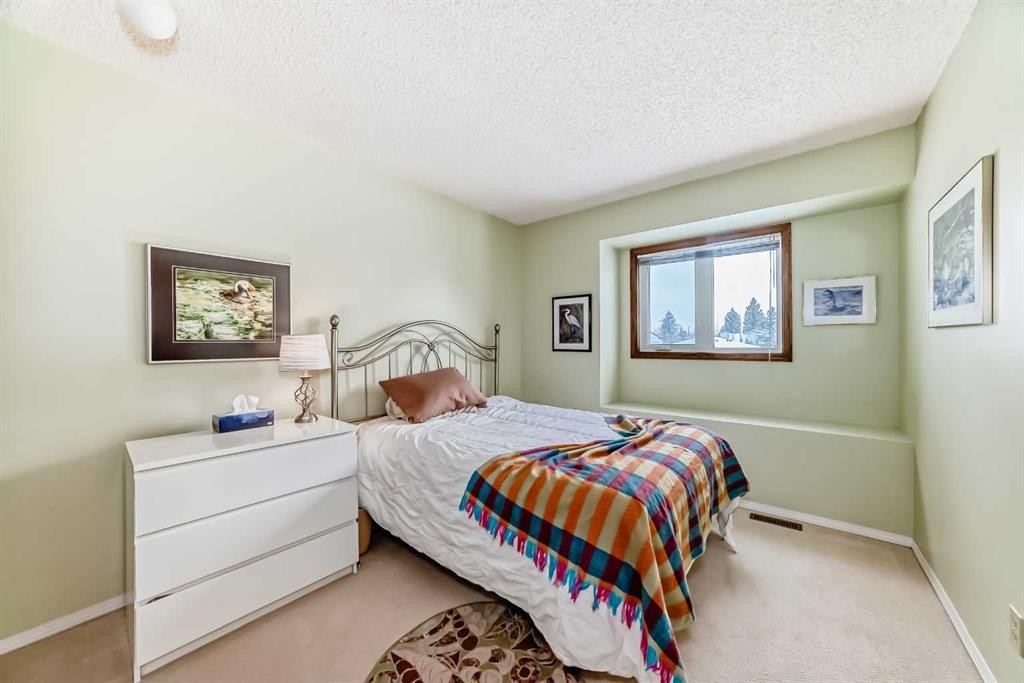 204 Edcath Place Nw, Calgary, AB - Indoor Photo Showing Bedroom