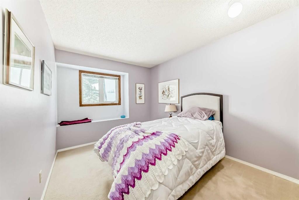 204 Edcath Place Nw, Calgary, AB - Indoor Photo Showing Bedroom