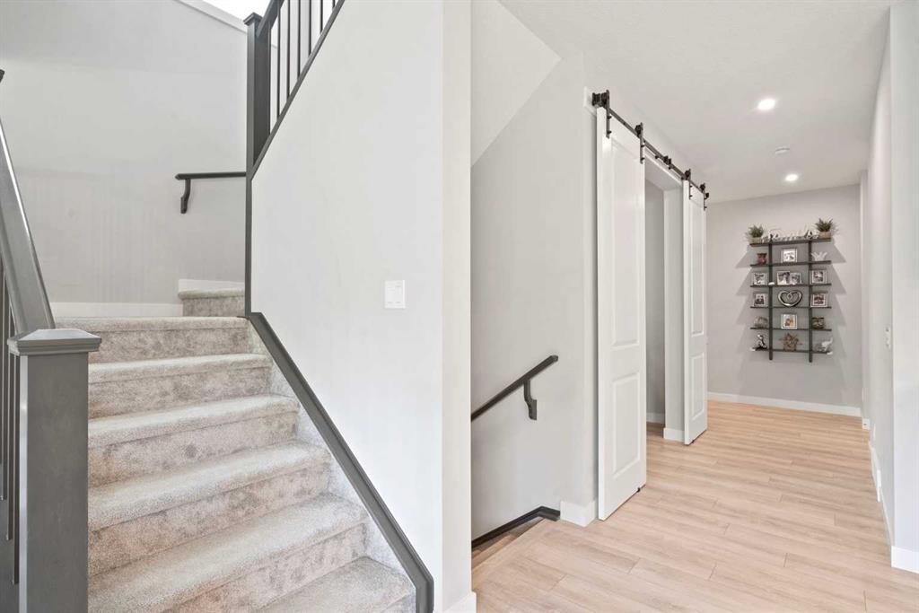 36 Cranbrook Cape Se, Calgary, AB - Indoor Photo Showing Other Room