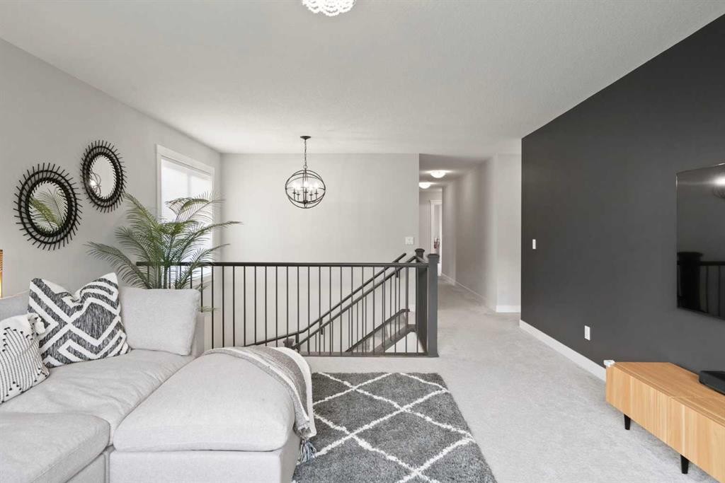 36 Cranbrook Cape Se, Calgary, AB - Indoor Photo Showing Other Room