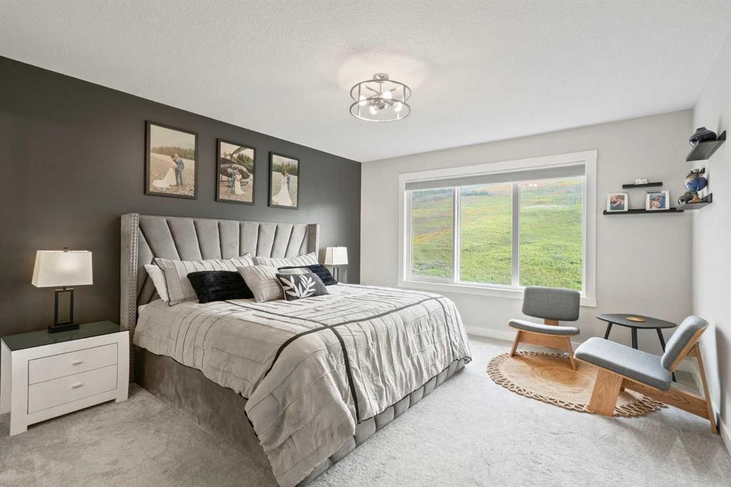 36 Cranbrook Cape Se, Calgary, AB - Indoor Photo Showing Bedroom