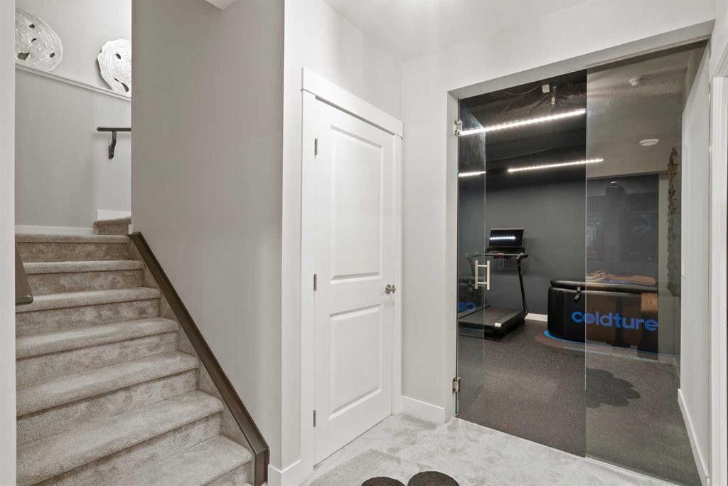 36 Cranbrook Cape Se, Calgary, AB - Indoor Photo Showing Other Room