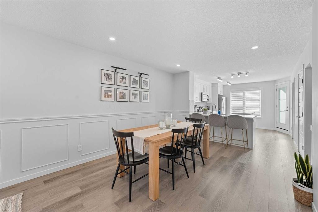 102-474 Seton Circle Se, Calgary, AB - Indoor Photo Showing Dining Room