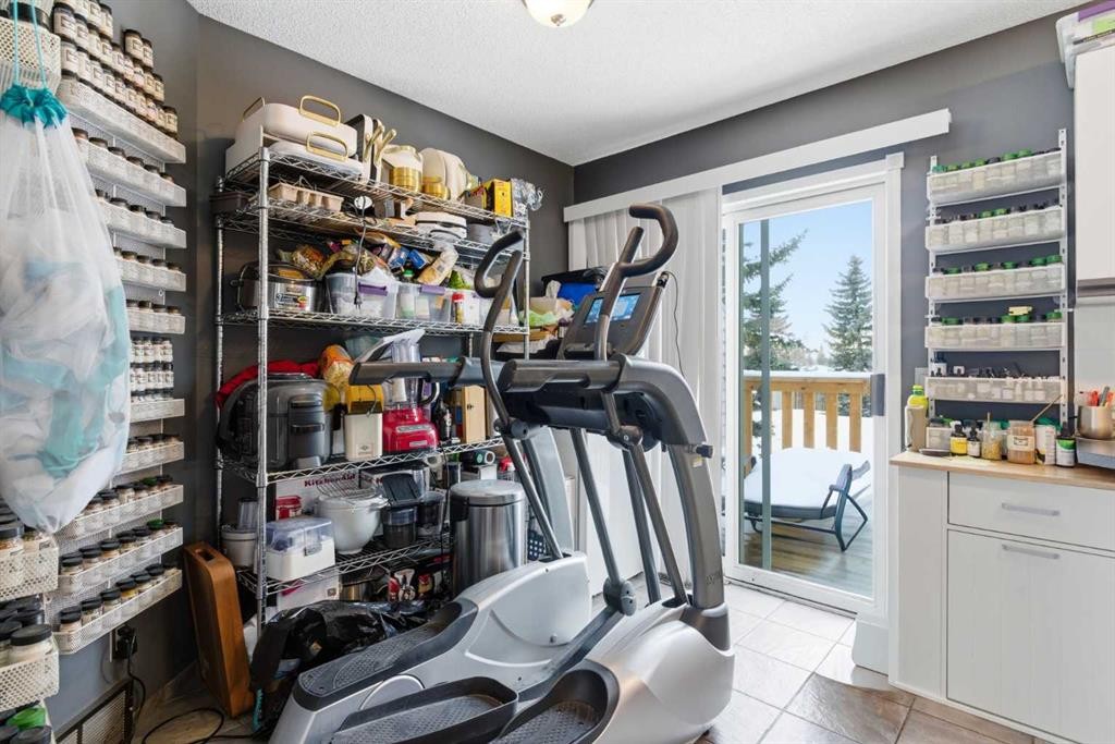 59 Abbeydale Villas Ne, Calgary, AB - Indoor Photo Showing Other Room
