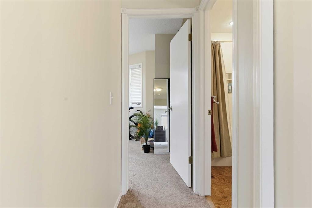 59 Abbeydale Villas Ne, Calgary, AB - Indoor Photo Showing Other Room