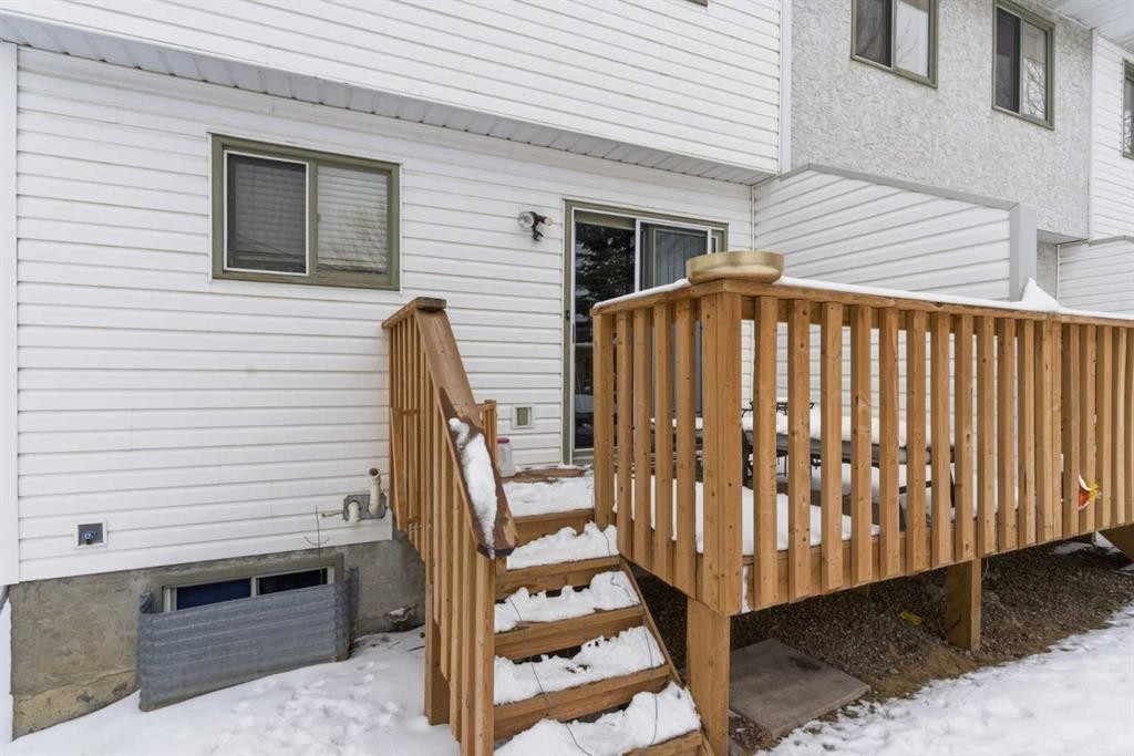 59 Abbeydale Villas Ne, Calgary, AB - Outdoor With Deck Patio Veranda With Exterior