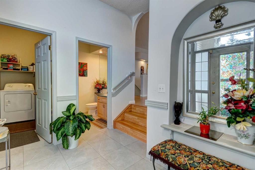 38 Millbank Hill Sw, Calgary, AB - Indoor Photo Showing Laundry Room