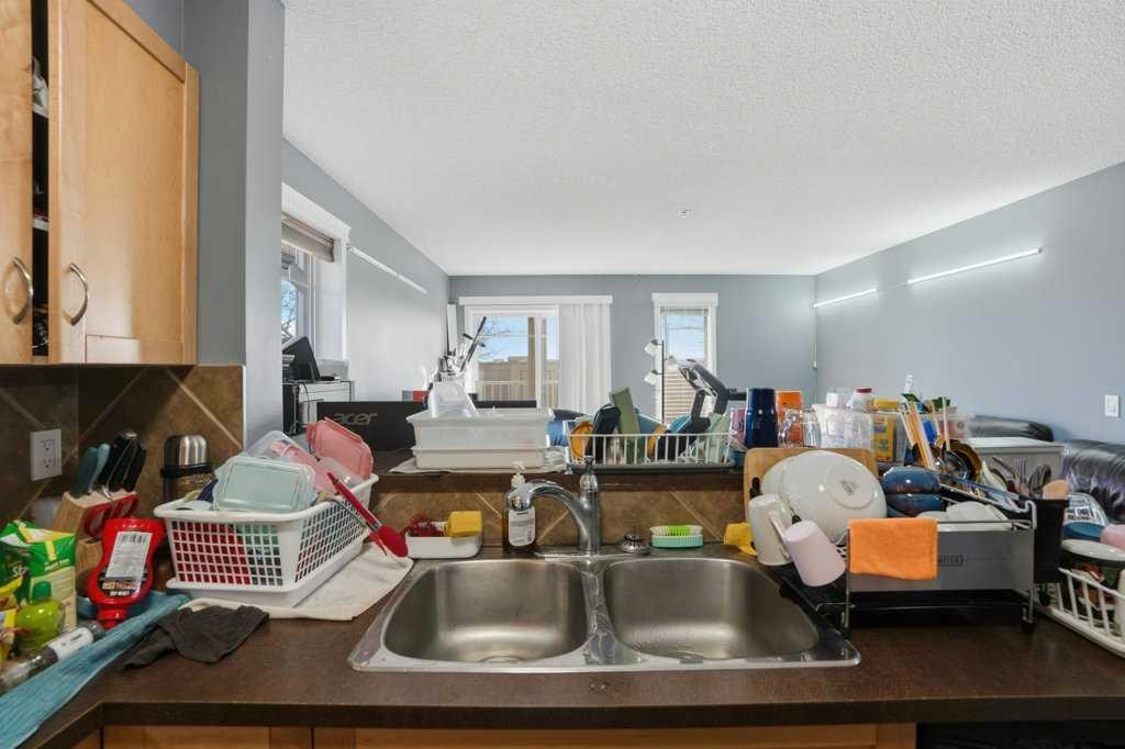 5106-70 Panamount Drive Nw, Calgary, AB - Indoor Photo Showing Kitchen With Double Sink