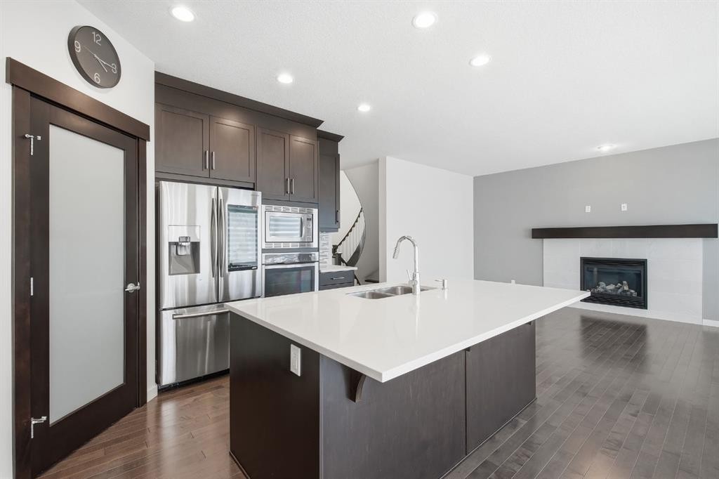 101 Evansborough Green Nw, Calgary, AB - Indoor Photo Showing Kitchen With Stainless Steel Kitchen With Double Sink With Upgraded Kitchen