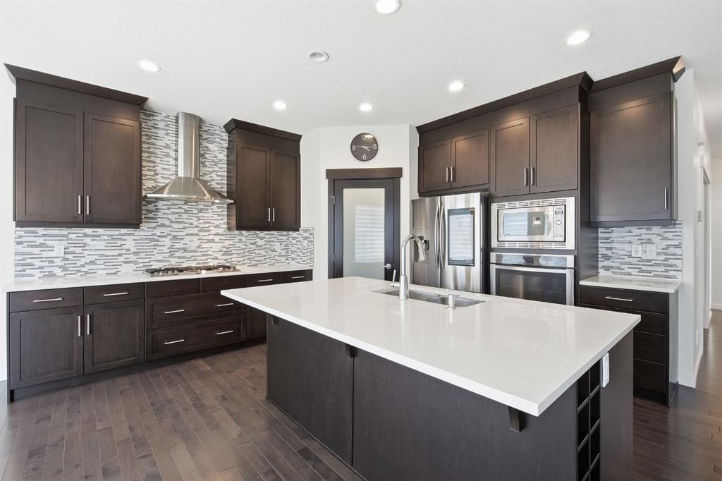 101 Evansborough Green Nw, Calgary, AB - Indoor Photo Showing Kitchen With Stainless Steel Kitchen With Double Sink With Upgraded Kitchen