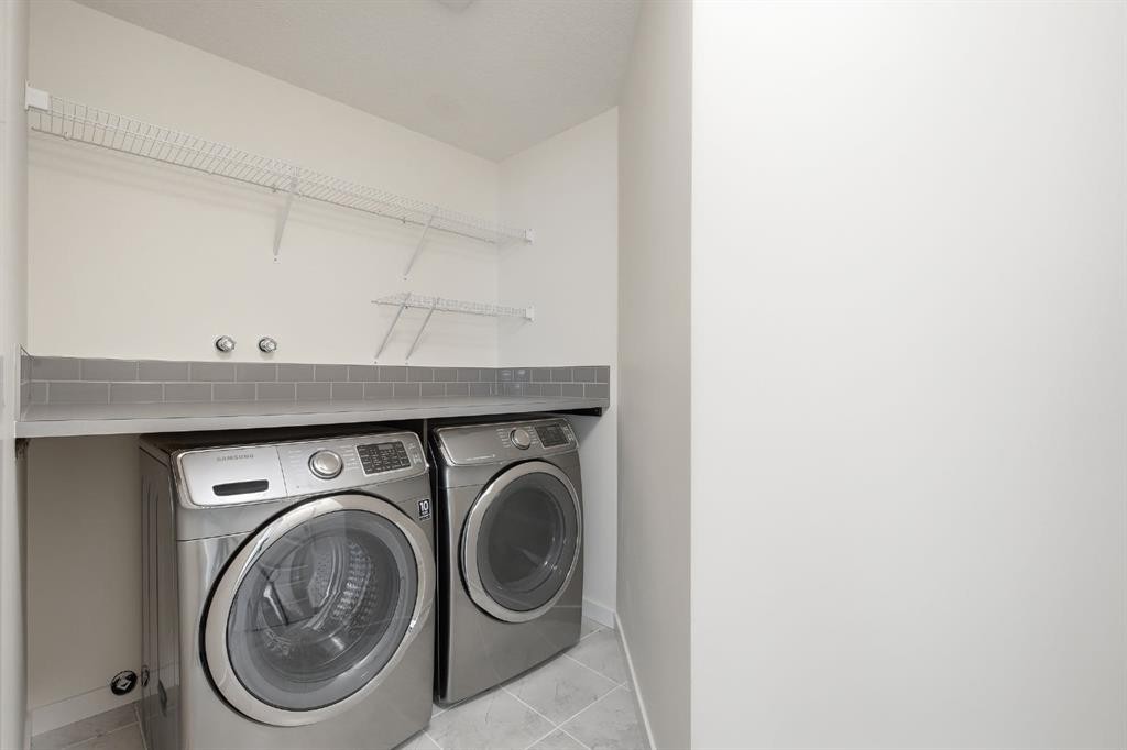 101 Evansborough Green Nw, Calgary, AB - Indoor Photo Showing Laundry Room